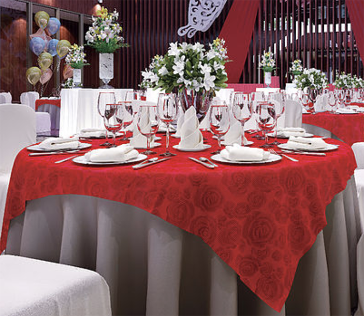 For color in your dining room area consider Sunshine Supply for these small plastic tablecloths with red roses on them.