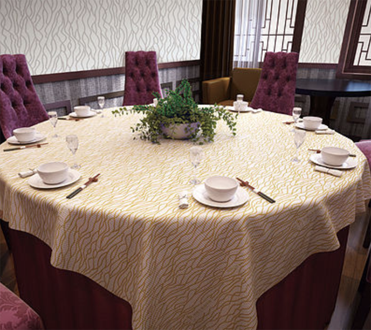 Protect your tables and add design with these small gold zebra patter plastic tablecloths from Sunshine Supply Company.